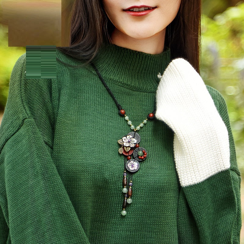wood flower necklace with model